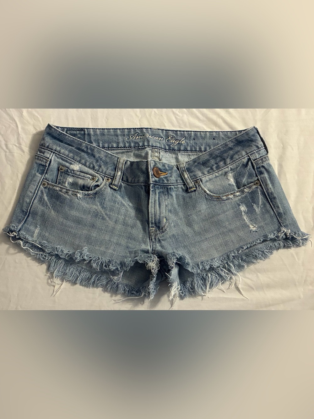 American Eagle Outfitters Light Wash Frayed Denim Cutoff Shorts